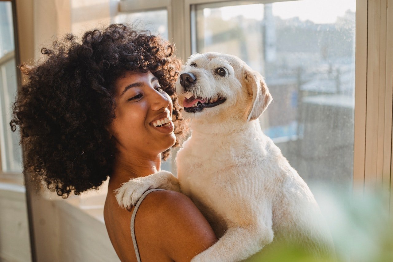Woman Carrying her dog